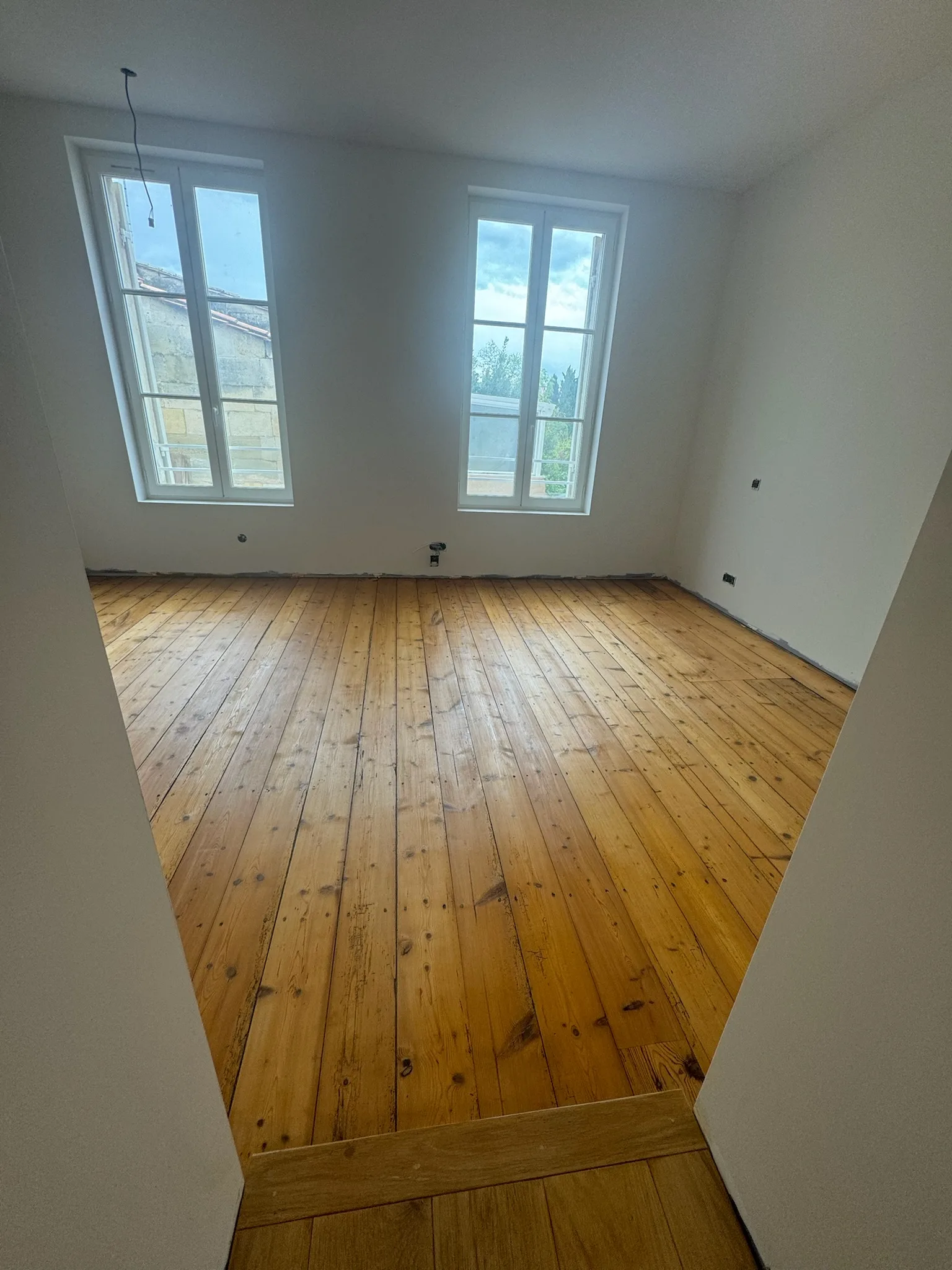 Ponçage et vitrification des anciens parquet